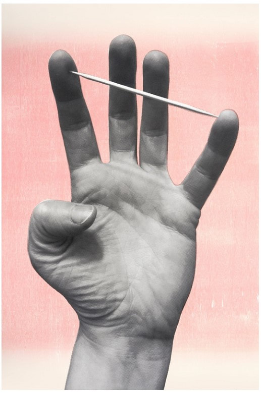 picture of a hand and toothpick
