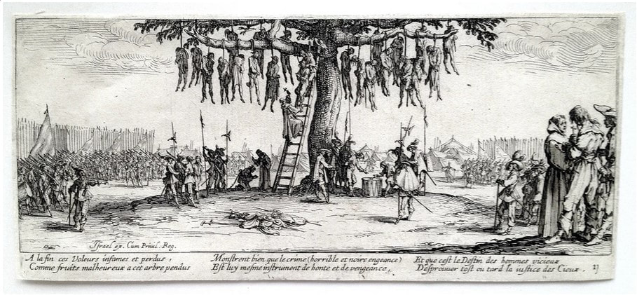 picture of bodies hanging in a tree