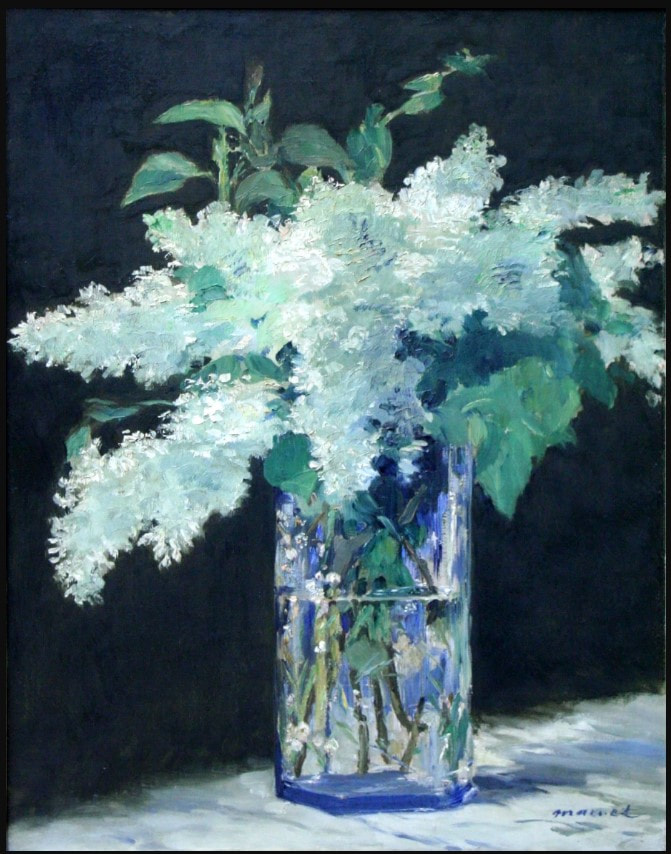 picture of a vase with lilacs
