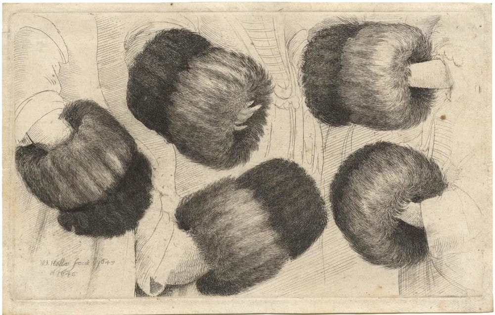 picture of five fur muffs