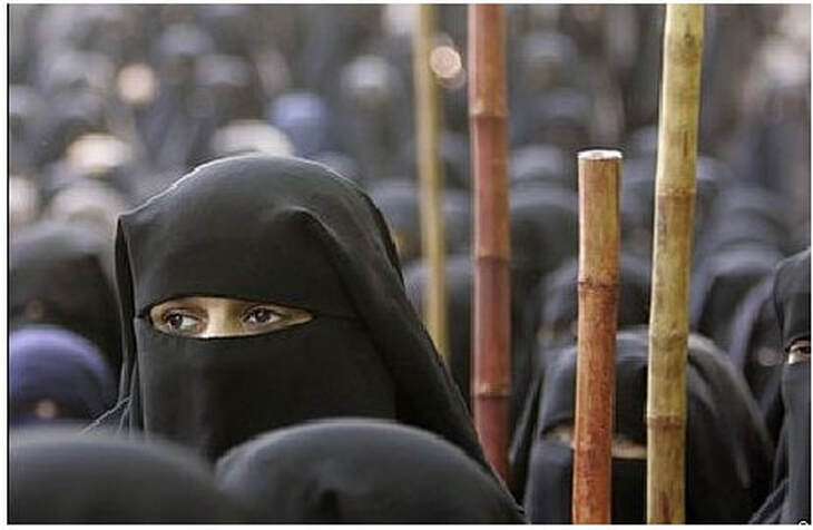 Picture of woman in burqa at Red Mosque during 2007 protests